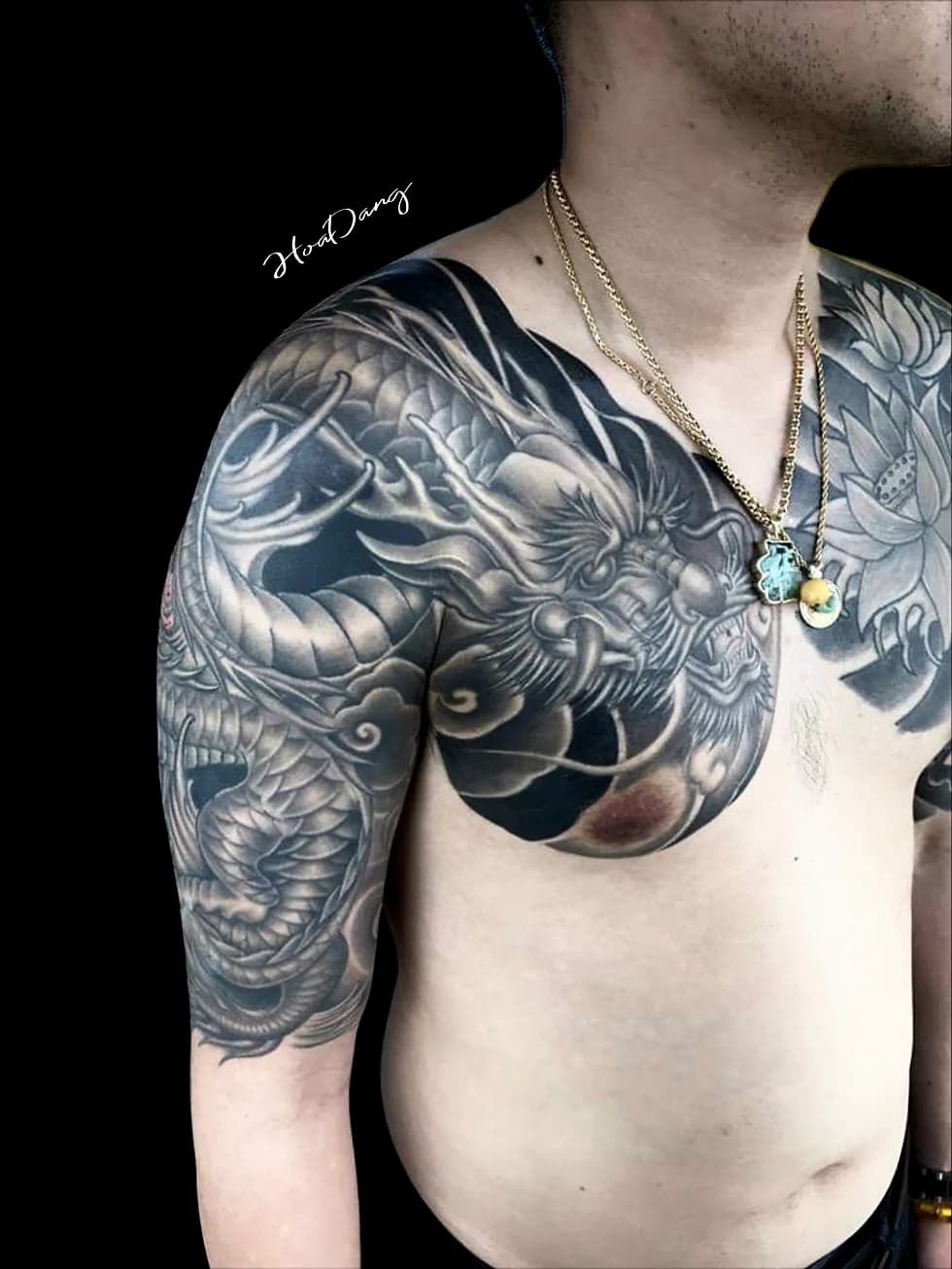 Large black and grey dragon chest and shoulder tattoo by HoaDang